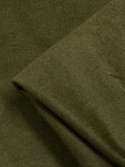 A wool cashmere fabric in a Olive colour. Heavy weight fabric suitable for winter garments such as coats, outerwear & jackets