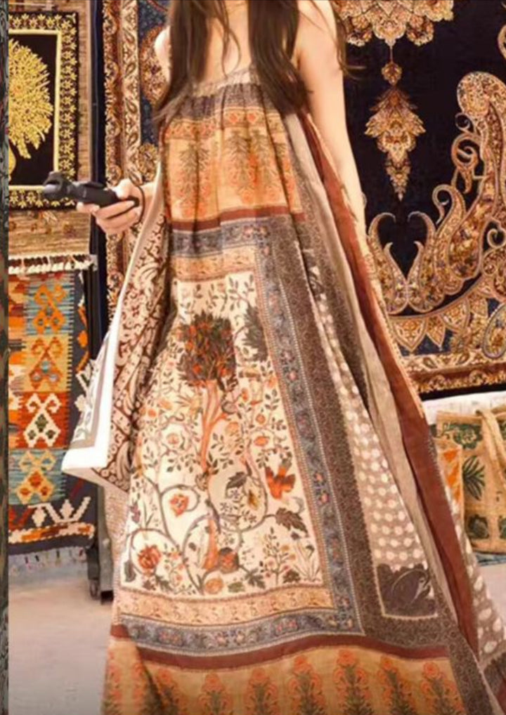 A woman in a vibrant, sleeveless dress made from Super Cheap Fabrics' Designer Rayon - Antique Tapestry (145cm) stands among ornate rugs and tapestries, holding a camera to capture the intricate designs surrounding her.
