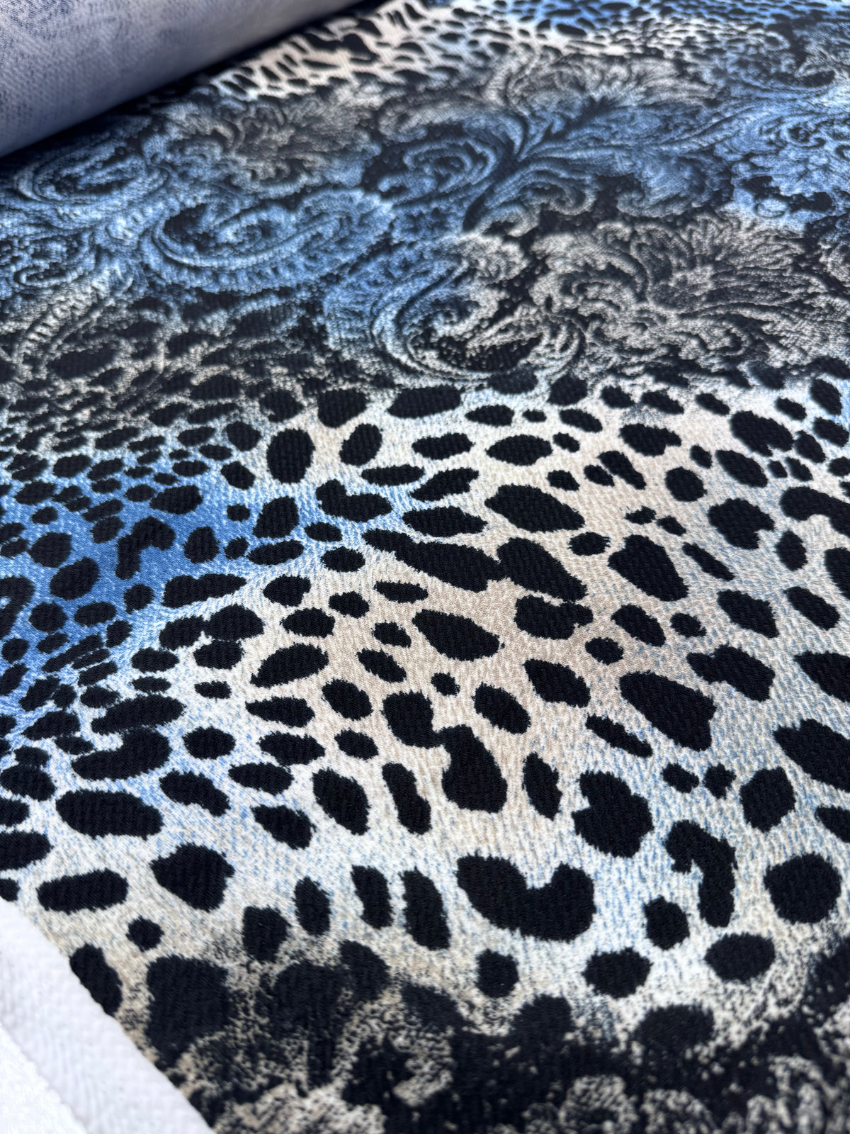 Azure Baroque textured knit fabric draped view