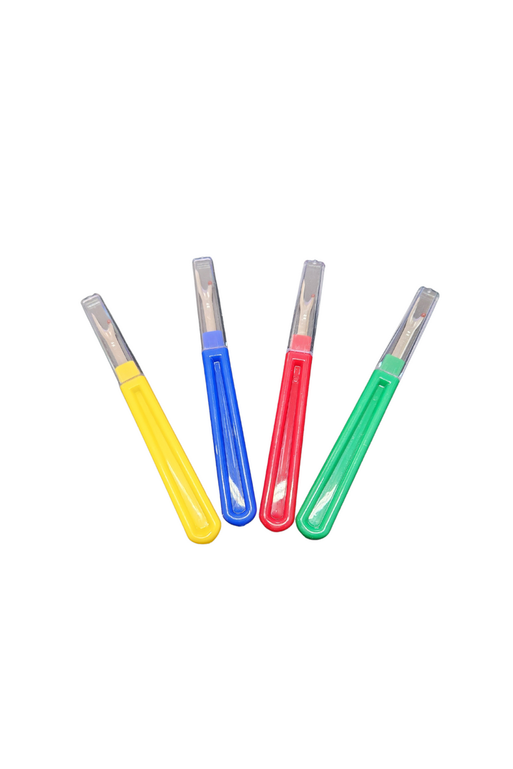 Four colorful plastic-handled craft knives with metal blades and transparent protective covers are arranged upright. Designed as versatile sewing tools, the handles are yellow, blue, red, and green respectively. These versatile tools are named "Unpicker" by Super Cheap Fabrics.