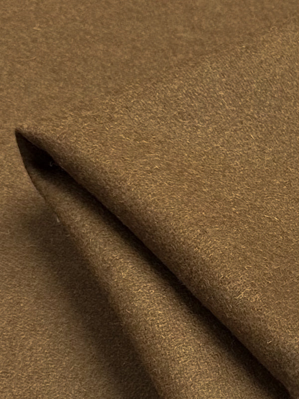 Close-up of Super Cheap Fabrics' Wool Cashmere - Nuthatch - 150cm, highlighting its luxurious texture and soft appearance. The fabric features an even color with a slightly fuzzy surface texture.