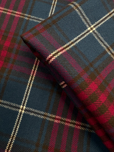Super Cheap Fabrics’ Flannel Tartan - Stirling Rose (145cm) is a medium-weight flannel with blue, red, black, and white crisscrossing stripes—ideal for shirts.