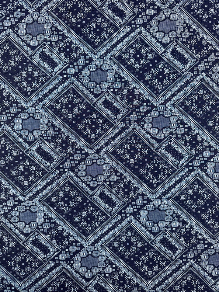 Designer Rayon - Navy Nomad by Super Cheap Fabrics features interlocking diamonds and squares in blue with intricate motifs and florals, creating a detailed, symmetrical textile ideal for versatile fabric or vibrant prints. Width: 145cm.