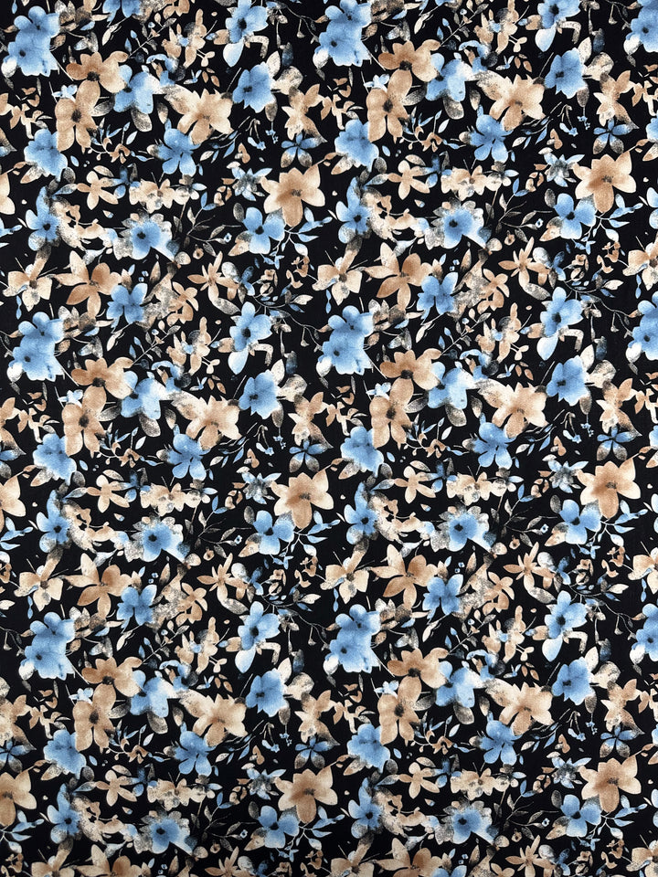 Super Cheap Fabrics' Designer Rayon - Dusty Petals - 145cm features a lively, dense floral pattern with small blue and beige flowers and greenish leaves on a black background, perfect for vibrant creations.