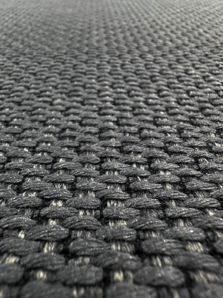Close-up of Super Cheap Fabrics' Basketweave Upholstery in Bacchus Blue Steel (142cm), highlighting its textured, dark gray fibers and geometric basket-like pattern—perfect for premium, high-end upholstery projects.